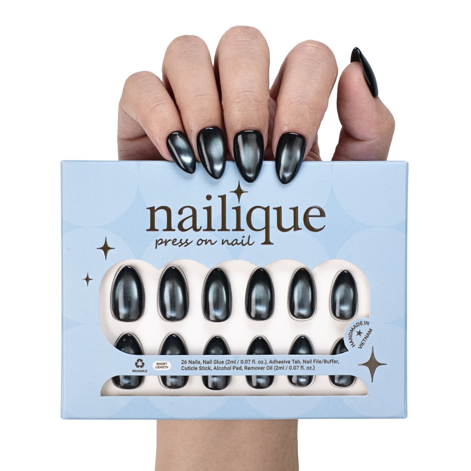 Short almond press-on nails by Nailique, handmade cat eye soft gel in midnight blue with black shimmer, 26 reusable tips with glue and remover