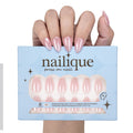 Handmade short almond press on nails in baby pink chrome with glitter shimmer, reusable gel tips, and lamp-curable glue by Nailique.