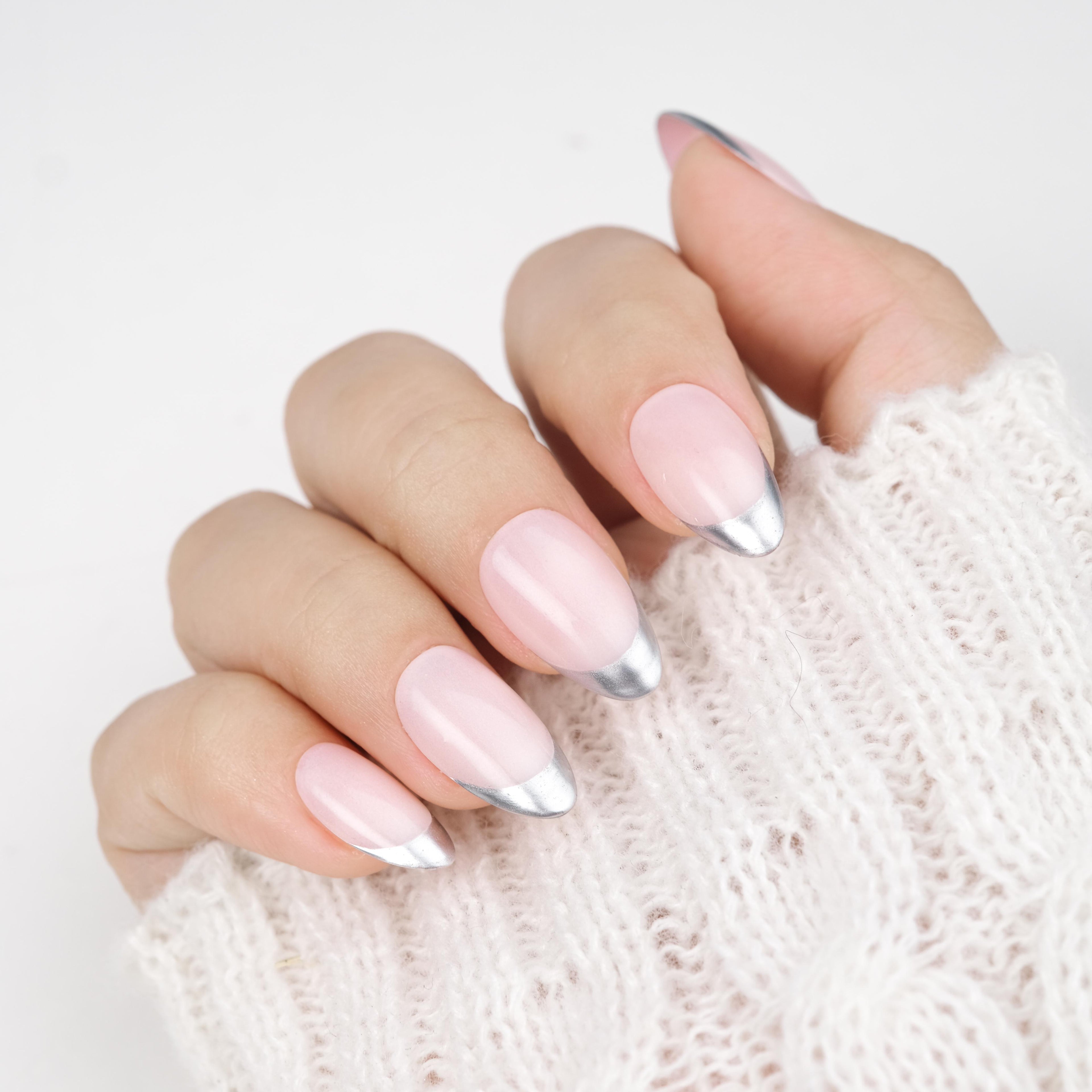 Nailique short almond press-on nails set with nude chrome finish, metallic silver edge, and minimalist soft gel design, 26 reusable pieces