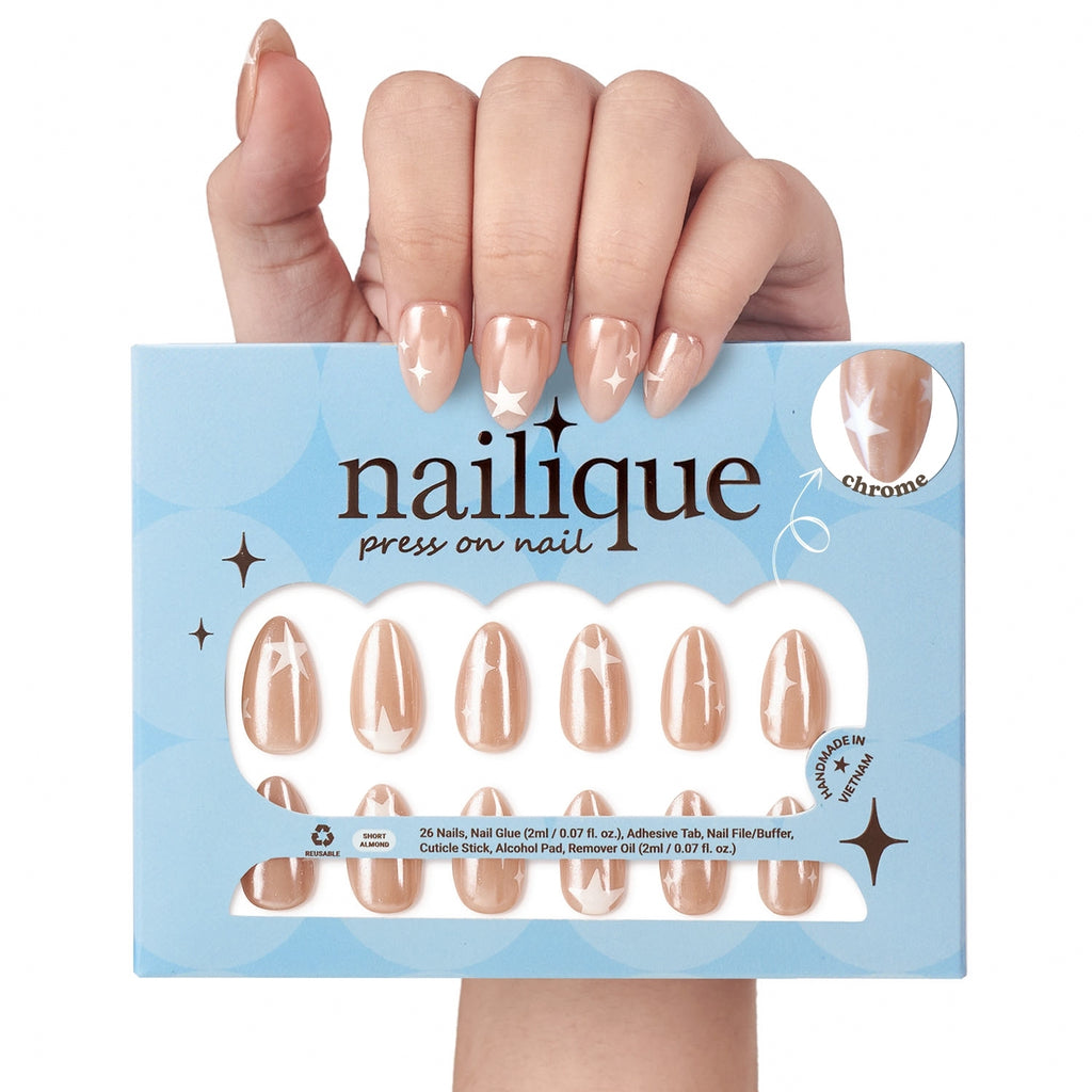 Handmade short almond press-on nails by Nailique featuring chrome glazed donut design with star accents on neutral nude soft gel.