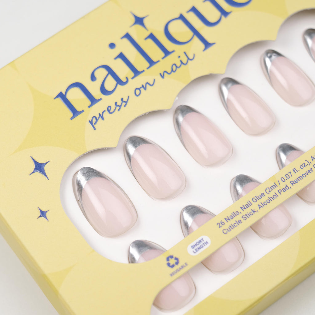 Nailique short almond press-on nails with nude chrome finish, silver metallic edge, handmade soft gel, minimalist reusable manicure set.