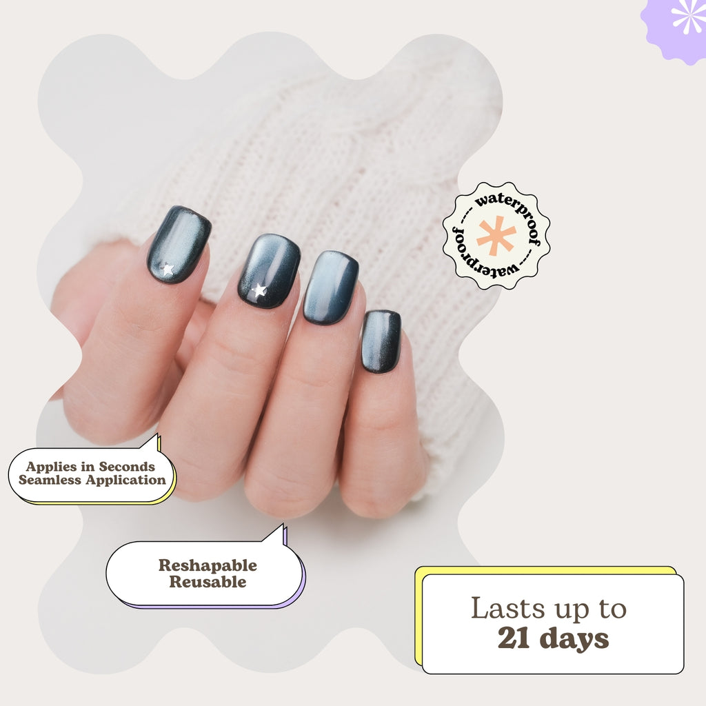 Handmade blue cat eye short square press-on nails with silver star design, reusable gel tips, and lamp-curable glue from Nailique.