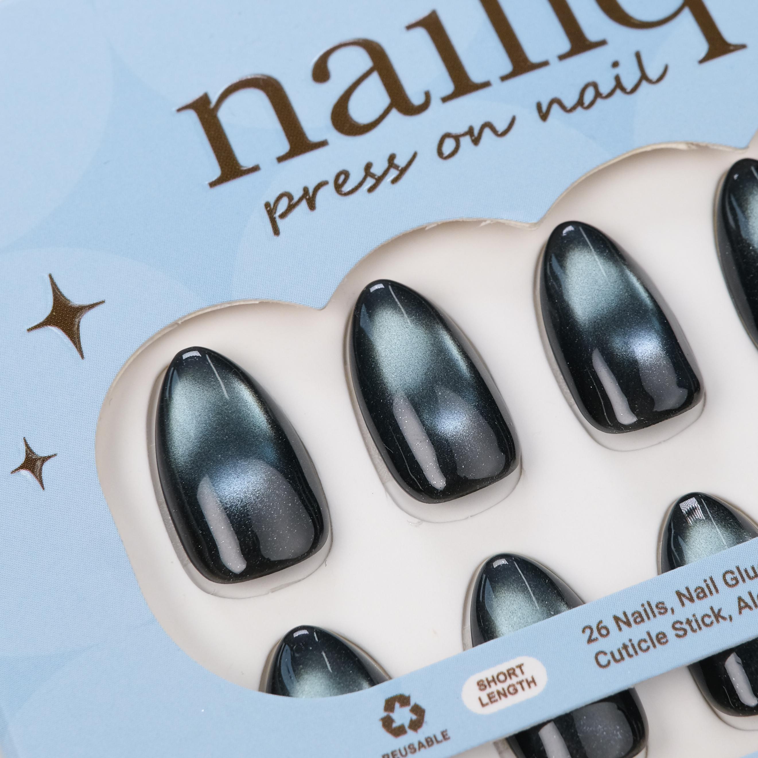 Handmade short almond press-on nails by nailique with midnight blue black shimmer, reusable gel tips, and included nail glue and remover