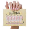 Handmade short almond press-on nails with chrome glazed donut design and ombre nude pink soft gel finish by Nailique.